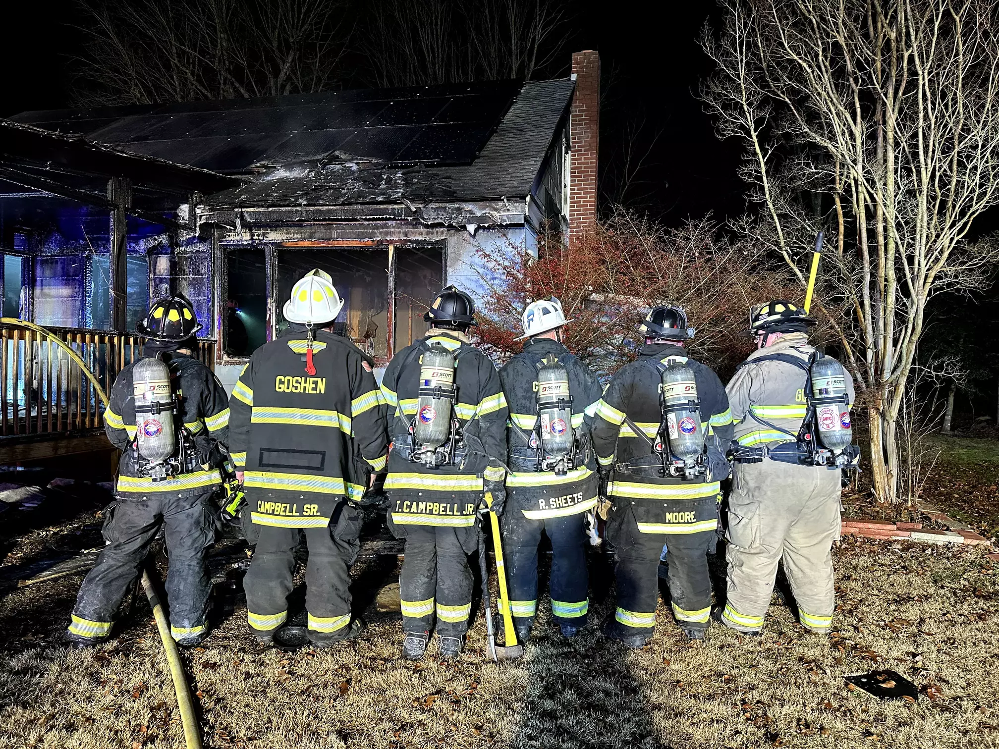 Volunteers from Goshen standing in front of the house